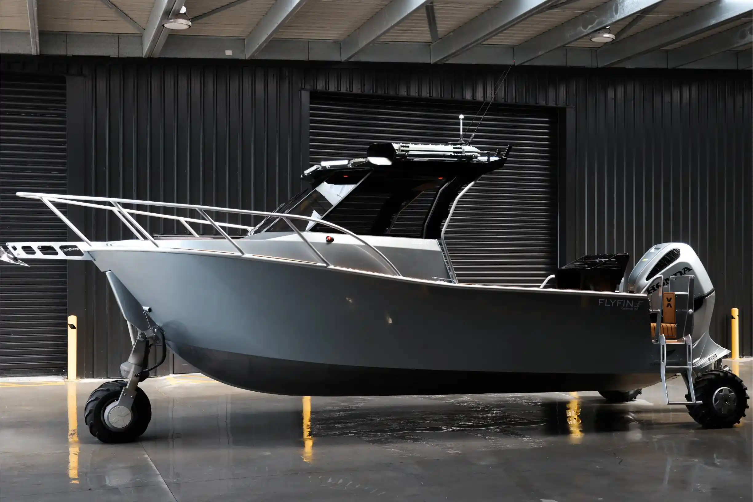 Flyfin 700HTA 7m amphibious boat with Tectrax T3000 Gen2 wheels, side profile
