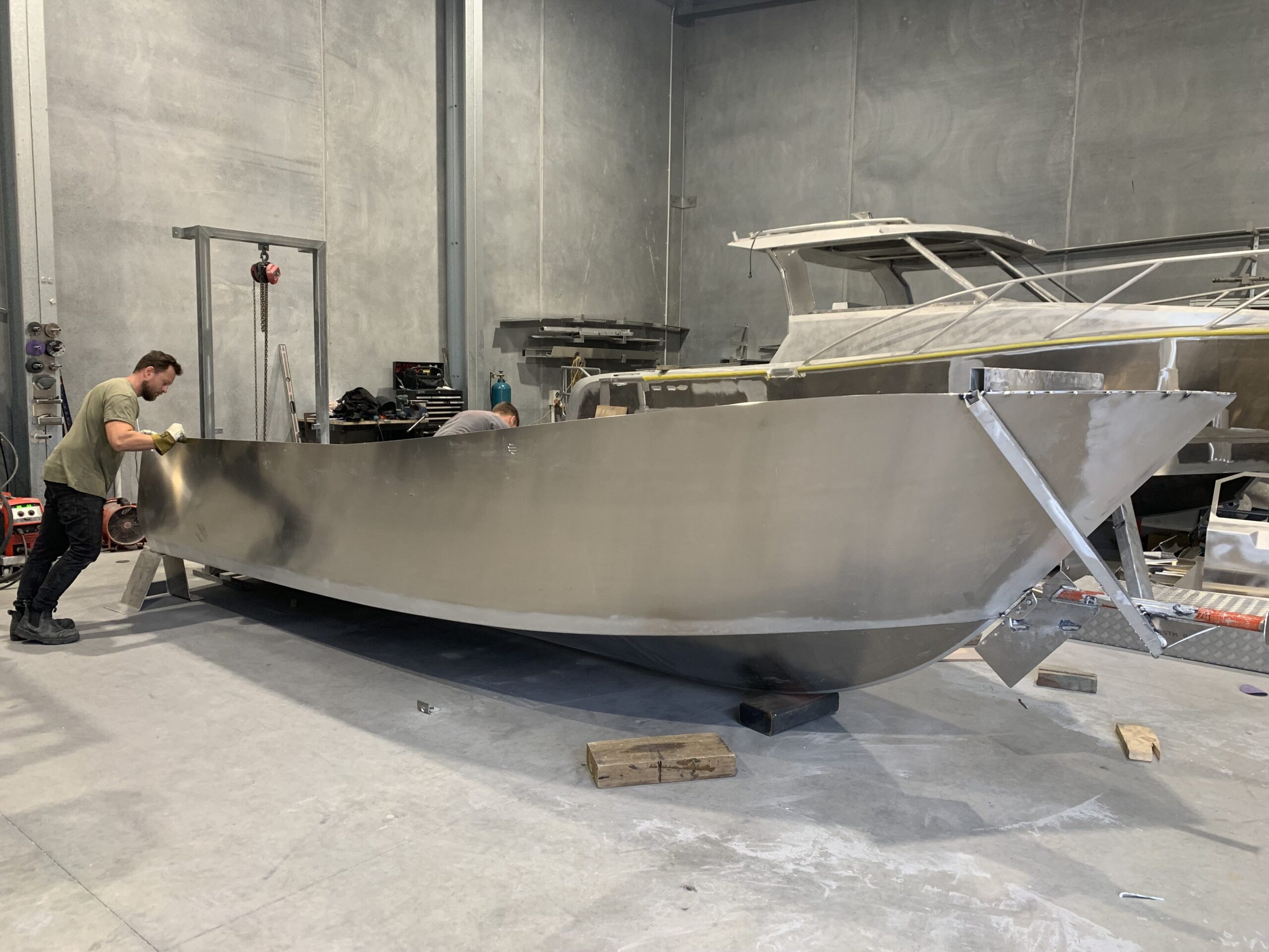 Aluminium boat in production welded from side