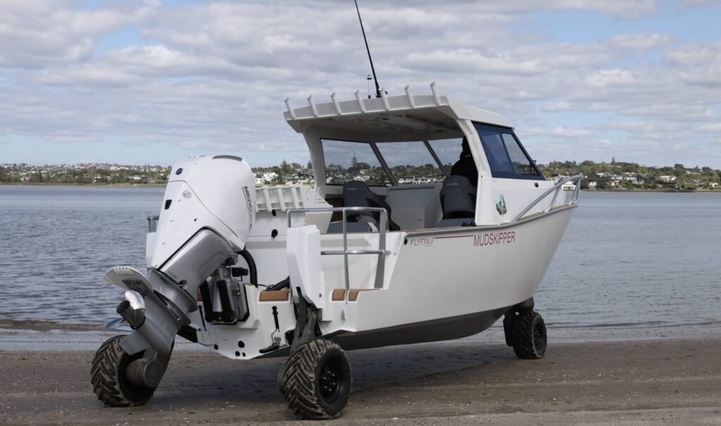 Flyfin 750HTA driving across the beach on Tectrax wheels